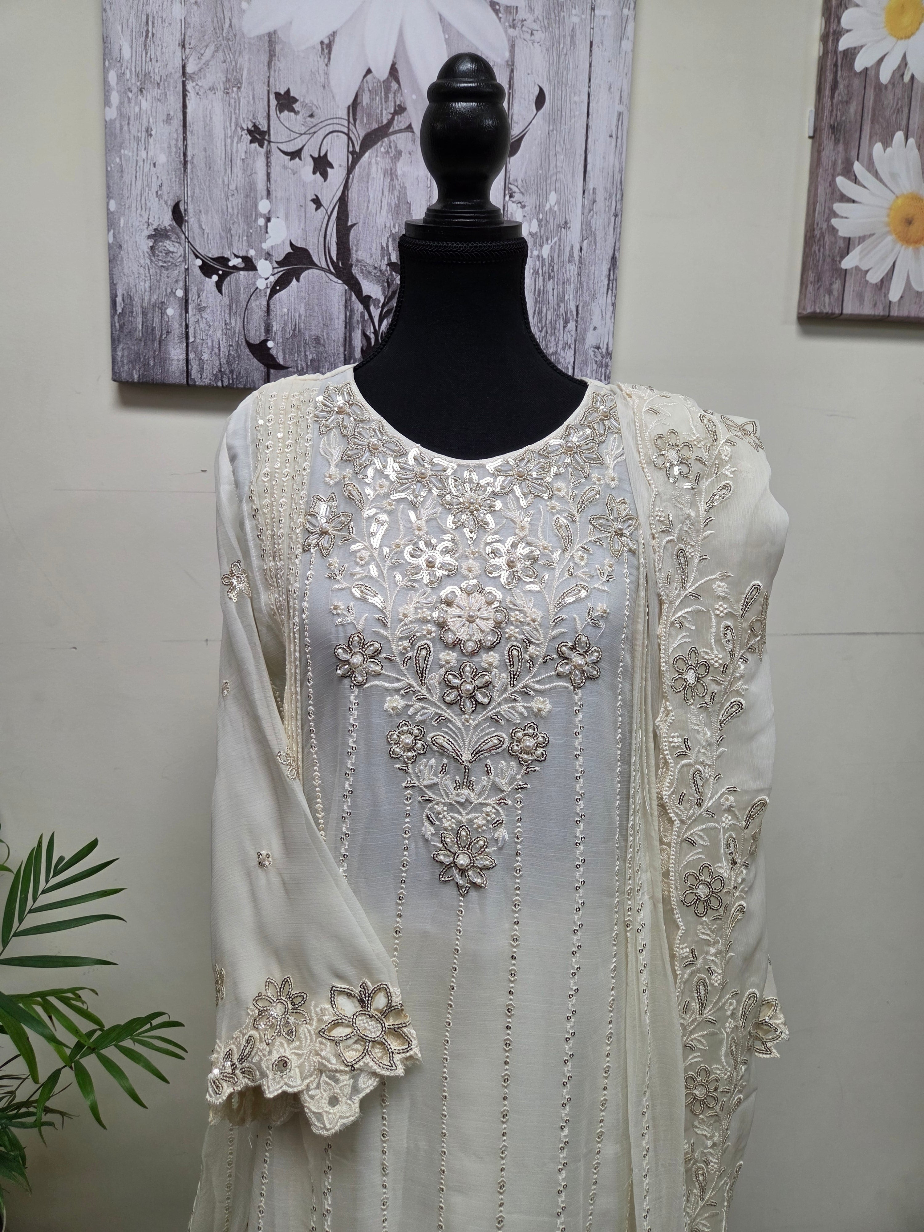 Elegant Chiffon Pleated Short Frock & Intricate Cutwork Palazzo Set - Boutique By MaryamBoutique By MaryamBoutique By MaryamOff - WhiteSElegant Chiffon Pleated Short Frock & Intricate Cutwork Palazzo Set