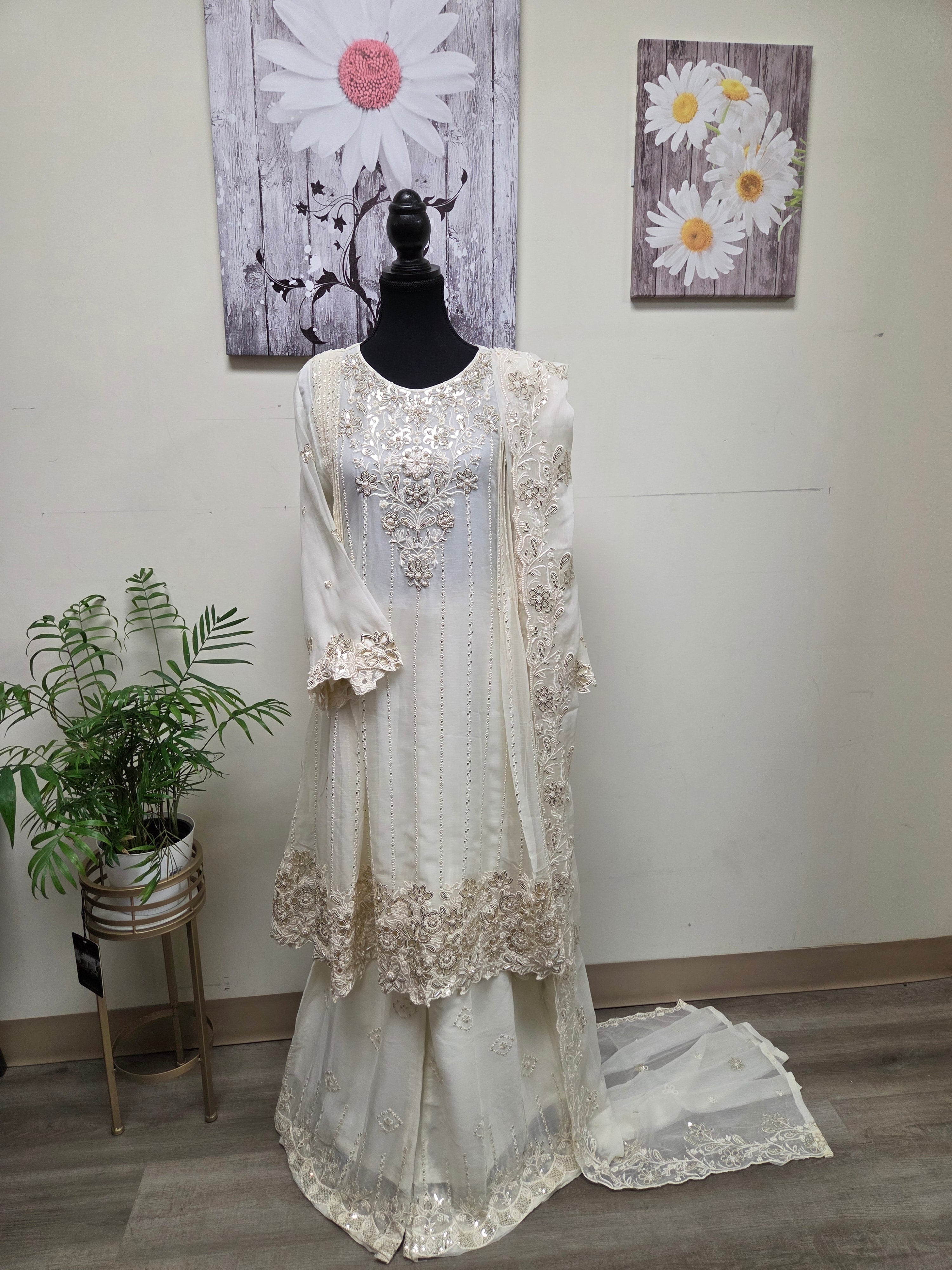 Elegant Chiffon Pleated Short Frock & Intricate Cutwork Palazzo Set - Boutique By MaryamBoutique By MaryamBoutique By MaryamOff - WhiteSElegant Chiffon Pleated Short Frock & Intricate Cutwork Palazzo Set