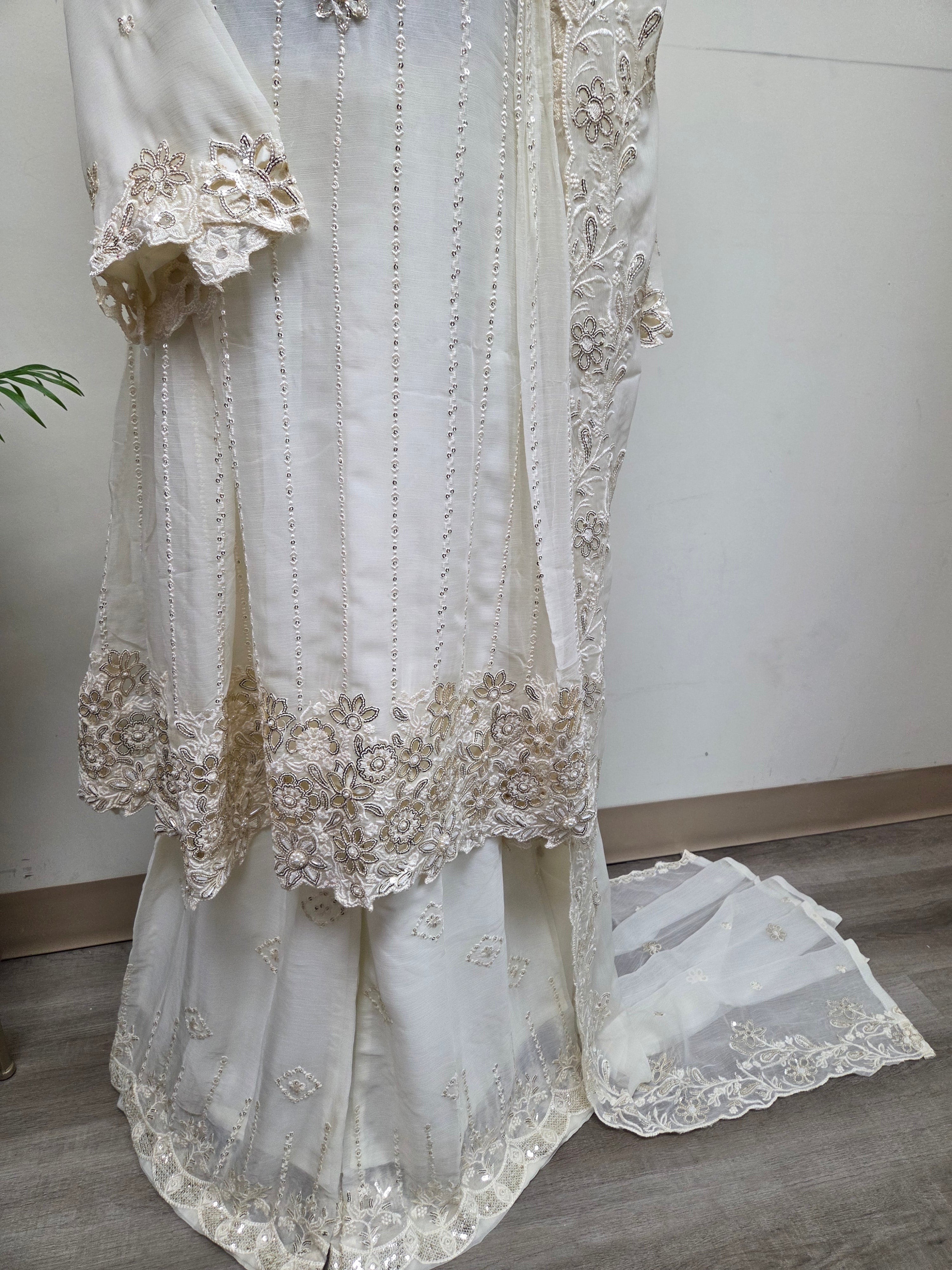 Elegant Chiffon Pleated Short Frock & Intricate Cutwork Palazzo Set - Boutique By MaryamBoutique By MaryamBoutique By MaryamOff - WhiteSElegant Chiffon Pleated Short Frock & Intricate Cutwork Palazzo Set